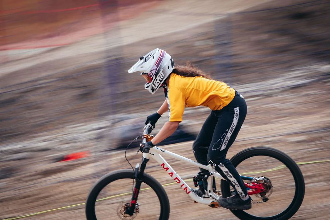 Photo shared by Marin Bikes on July 26, 2024 tagging @marthagmarthag, @crankworx, and @photosbykateland. May be an image of 1 person, racing a vehicle, bicycle and text.