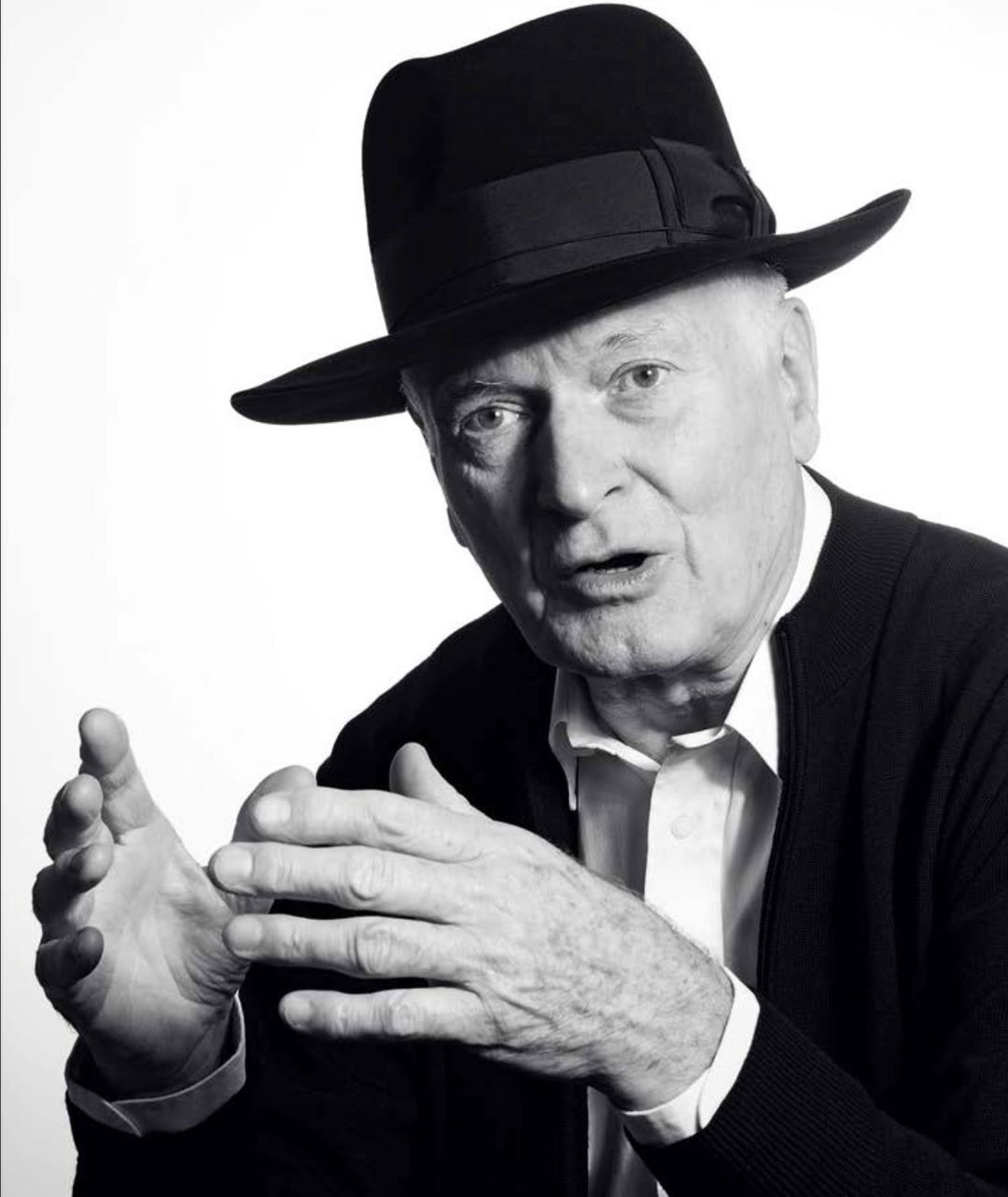 Photo by Bowers & Wilkins on July 26, 2024. May be a black-and-white image of 1 person, hat, bowler hat and text.
