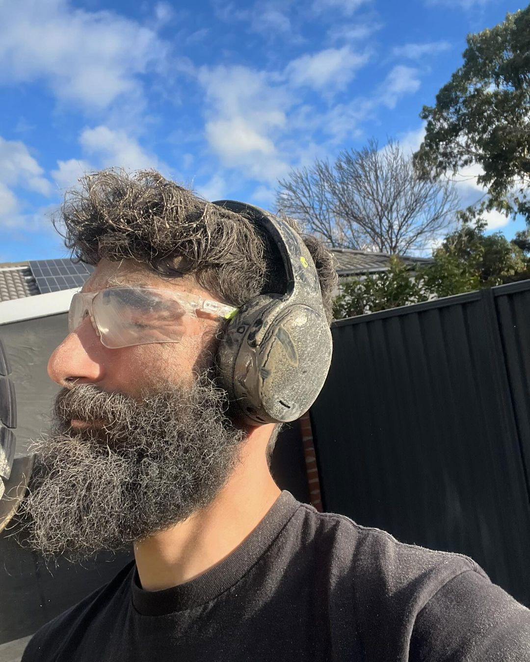 Photo shared by Nick Boserio on July 26, 2024 tagging @skullcandy. May be an image of 1 person, beard, glasses and text.